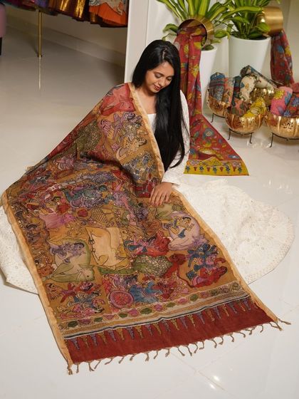 This is a glimpse into my Kalamkari Edition, featuring a wide array of hand-painted dupattas and fabrics from the Indralokam series. Each piece is a unique story, available for you to customize into your dream outfit.