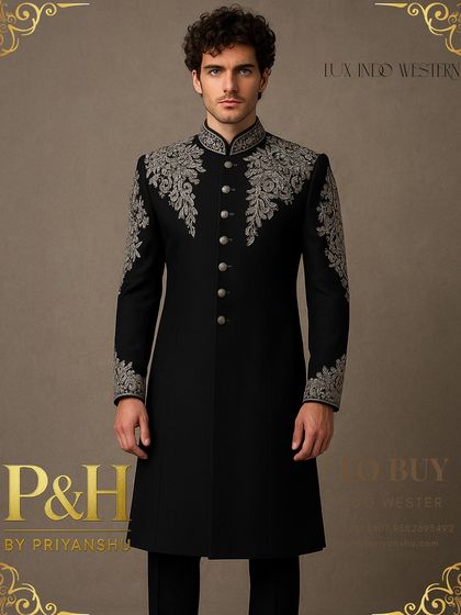 A detailed view of the intricate silver hand-embroidery on the black Indo-Western suit. Each motif is carefully placed to enhance the garment's sharp tailoring and luxurious feel.