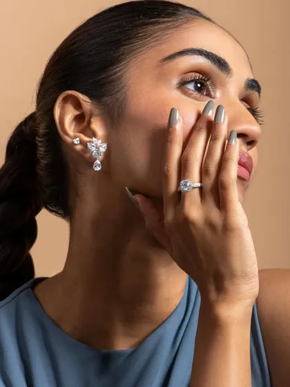 A shoot for Nipura Fashion, focusing on fine jewellery. The soft lighting and neutral tones emphasize the sparkle and elegance of the diamonds.