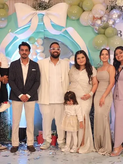 A lovely group photo with family and friends at the pastel-themed baby shower for Baby Jain.