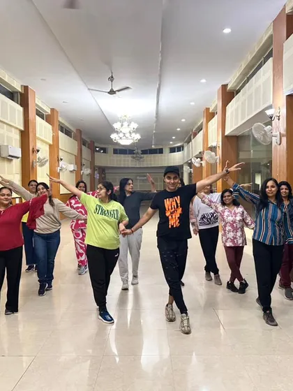 The best performances start with fun rehearsals. This picture captures the spirit of our dance family, learning and laughing together in one of our group sessions. We believe in dancing to your own rhythm and creating memories along the way.