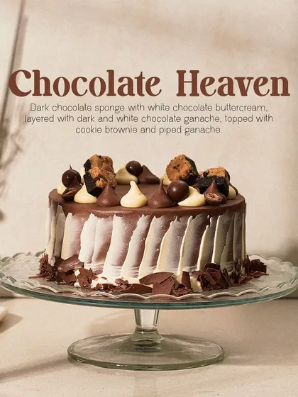 My Chocolate Heaven cake is a dream for those who love variety. It features dark chocolate sponge, white chocolate buttercream, and is topped with chunks of cookie brownie and piped ganache.