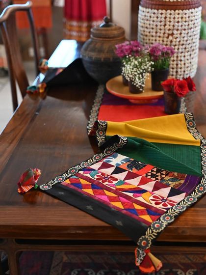 Another patchwork runner in autumnal colors, this one trimmed with a beautiful vintage Soof embroidery border from Kutch.