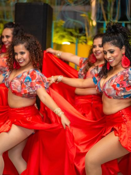 A beautiful moment of connection during our routine. The smiles and linked hands show the teamwork and joy that are at the heart of our ladies' performance team.
