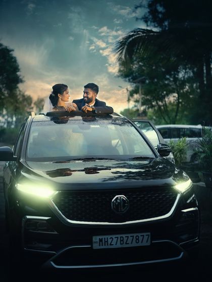 A creative and stylish shot of a Christian couple posing in their wedding car. I love finding unique angles to create memorable and modern wedding photos.