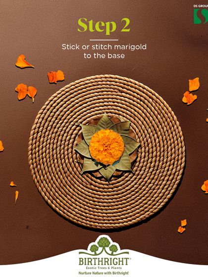Step 2: Add a touch of color and tradition by sticking or stitching a marigold flower to the center of your leaf base. This brings a festive and natural element to your creation.