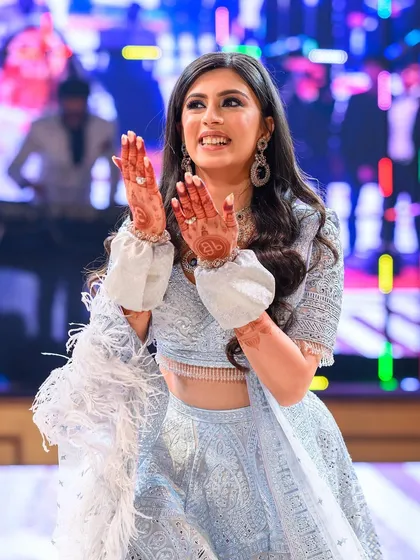 The joy on her face says it all! A bridal solo is a celebration, and I make sure the choreography reflects that happiness.
