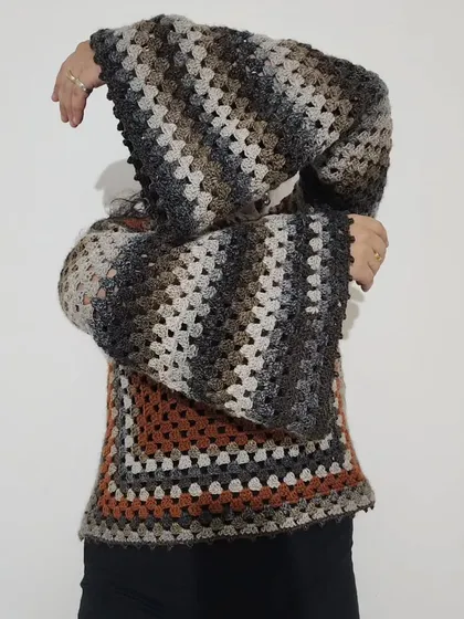 The bell sleeves on this Retro Sweater create a fun and dramatic silhouette.