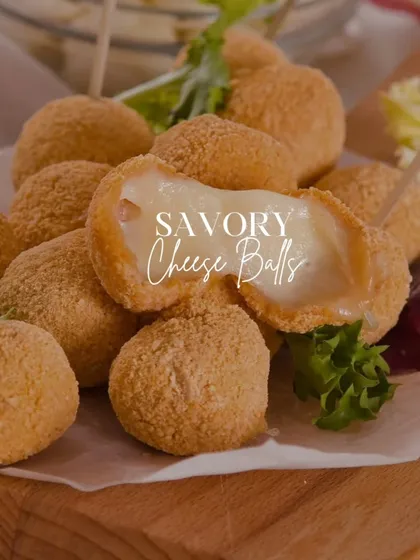 A true crowd-pleaser, my savory cheese balls are golden and crispy on the outside with a warm, gooey cheese center. They are the perfect bite-sized appetizer to get any party started.