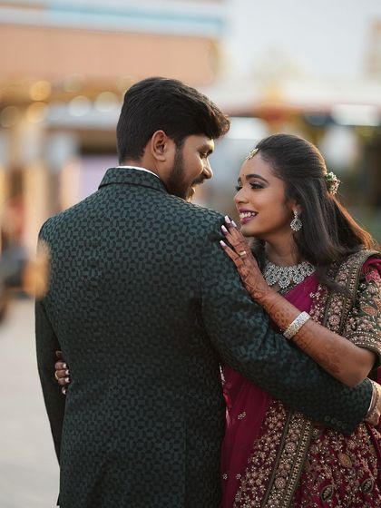 Another romantic shot of Dr. Saruna and her groom. Her elegant makeup and hairstyle are perfect for these timeless couple photos.