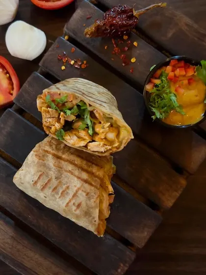 Another look at the delicious Spicy Tandoori Wrap, filled with tandoori-flavored protein and fresh veggies. It's a flavor explosion in every bite.