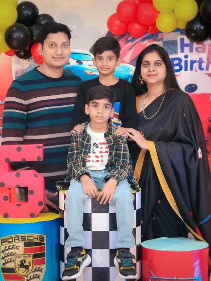 A thrilling 'Dinosaur' themed birthday party, with prehistoric backdrops, dinosaur cutouts, and lush greenery, transporting guests to a Jurassic world.