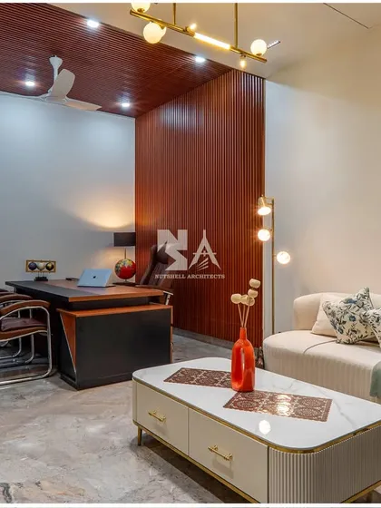 A home office should be both inspiring and functional. We designed this workspace with rich wood paneling and a sleek executive desk to create a professional atmosphere, while a comfortable seating area provides a space for relaxation and informal meetings.