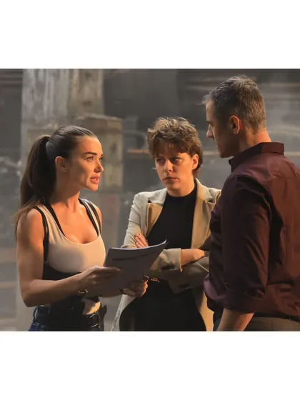 A behind the scenes moment on the 'CRAKK' set, discussing a scene with Amy Jackson. Collaboration with the actors and director is key to ensuring the costumes feel authentic to the character and story.