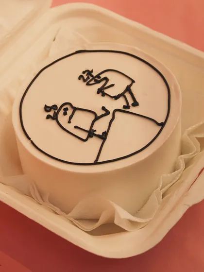 Our bento cakes can also feature fun and quirky line-art designs, customized to your request.