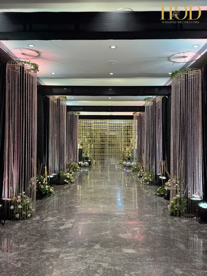 The entrance hallway with its dramatic crystal pillars, creating a sense of grandeur and luxury for guests as they arrive.