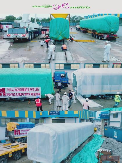 Workers for Total Movements prepare the new Namma Metro coaches for transport. Our on-site videography documents the crucial preparation stages of large-scale logistics projects.