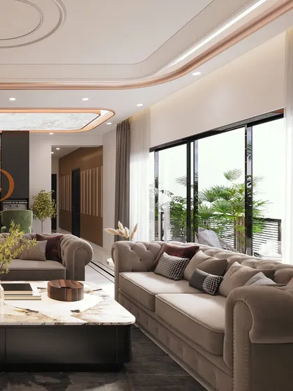 This shot captures the elegant flow of the living space, with its curved ceiling details, luxurious tufted sofas, and large windows that connect the indoors with the balcony.