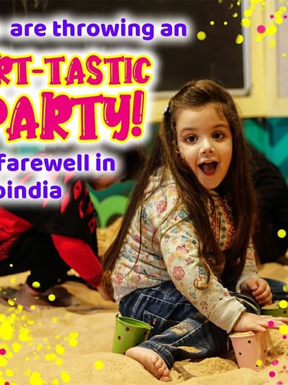 A candid shot of a girl enjoying the sandpit during a party. It's a space for pure, unadulterated fun.