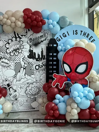 A Chibi-style Spider-Man theme, perfect for younger fans. The backdrop features a fun comic-strip design, and the balloon garland uses a muted red, white, and blue palette for a modern look.