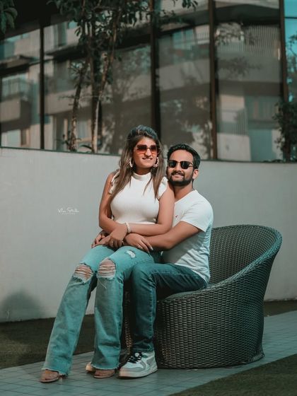 A relaxed and happy portrait in a contemporary garden space. This photo shows how we can find beautiful, modern backdrops for a pre-wedding shoot anywhere in the city.
