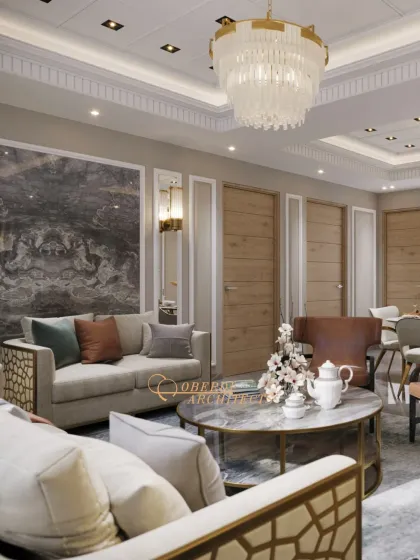 A closer look at the lounge area, showcasing sofas with intricate metalwork, a marble coffee table, and a dramatic marble feature wall.