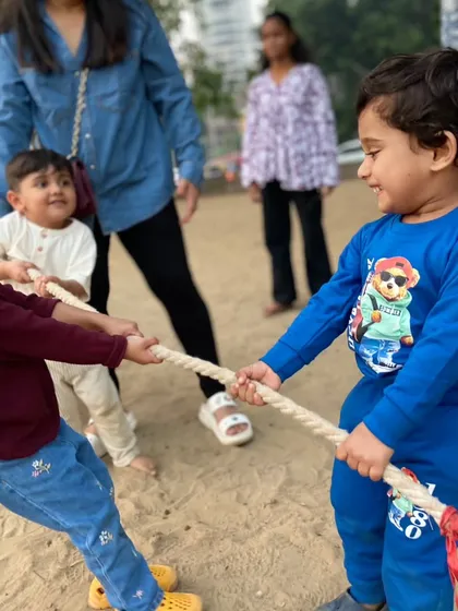 Even our youngest members get in on the action. This tug-of-war at a beach party shows how we build teamwork and strength through play. It’s all about creating happy, active memories for toddlers and kids.