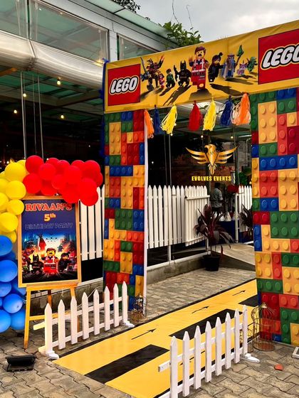 The entrance arch for the LEGO-themed party. We use custom printed flex and a pathway to create an immersive experience from the very beginning.