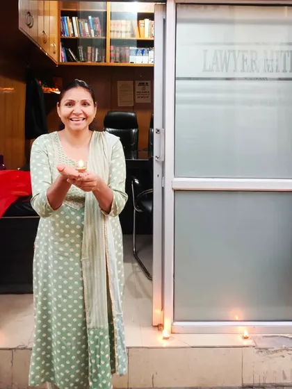 A colleague celebrating Diwali at our "Lawyer Mitra" office. Our workspace is also a place of shared festivities and light.