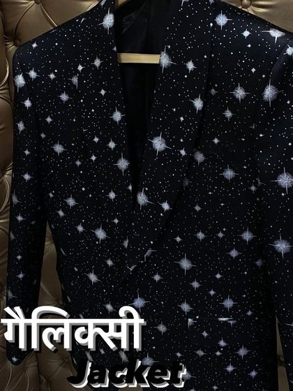 A unique "Galaxy" jacket. This black blazer with a star-like pattern is perfect for someone looking for a truly standout piece for a party.
