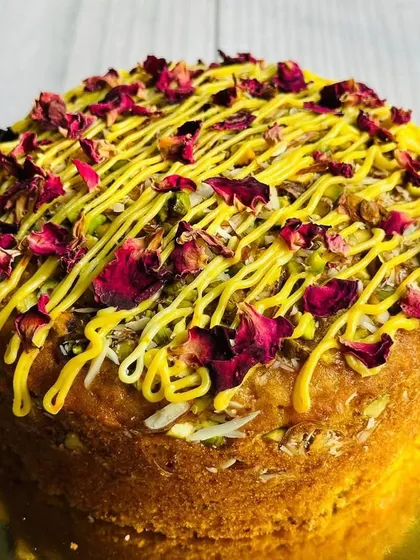 My special Thandaai Tea Cake is another Holi creation. It's a flavorful cake topped with a mix of pistachios, almonds, and a delicious Thandaai-flavored cream cheese.