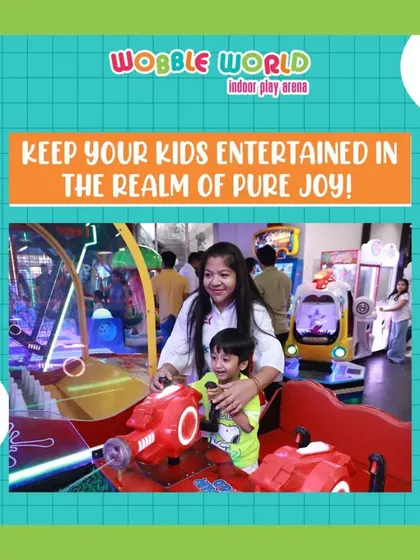 A mother and son team up on one of our arcade-style games. It's a great way for parents and kids to play together.