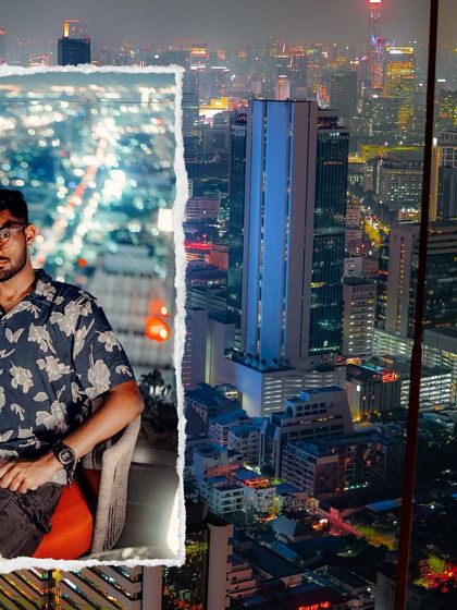 Chilling at a rooftop bar in Bangkok. The city's skyline at night is a sight to behold, a perfect end to a day of exploring.