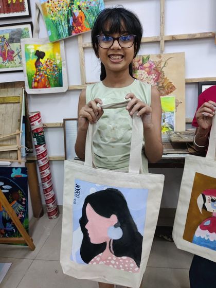 More happy faces and amazing creations from our specialty workshops, including tote bags, Mother's Day gifts, and abstract art explorations.