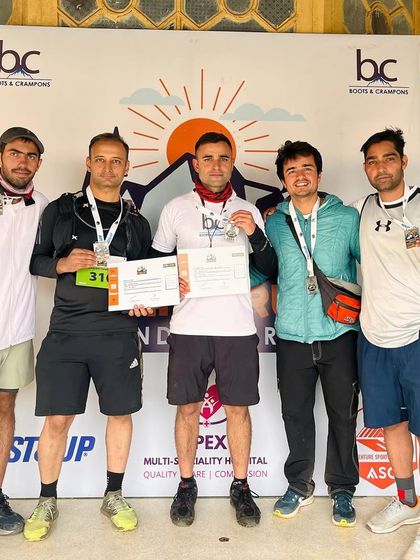 Celebrating with fellow finishers of the Indrahar Pass Summit. We all pushed our limits and made it through.