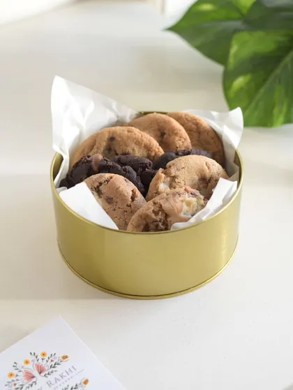 A tin full of assorted fresh-baked cookies, a simple and heartwarming Rakhi present.