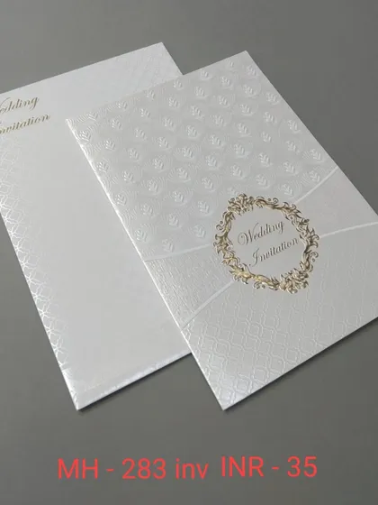 A very simple and affordable white invitation with a textured background and a classic gold wreath emblem. Perfect for a clean and minimalist announcement.