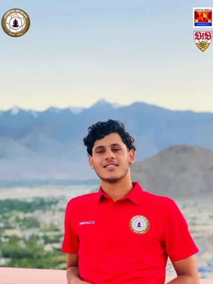 A Sudevan standing against the breathtaking backdrop of Ladakh during the Climate Cup tour. We teach our players that pain and hardship are a privilege, not a curse.