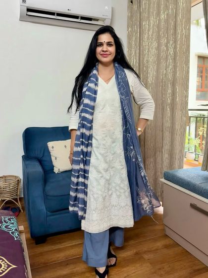 This white chikankari kurta paired with blue palazzo pants and a striped dupatta is a comfortable and stylish look from my May photo dump. It's a great example of mixing and matching different pieces.
