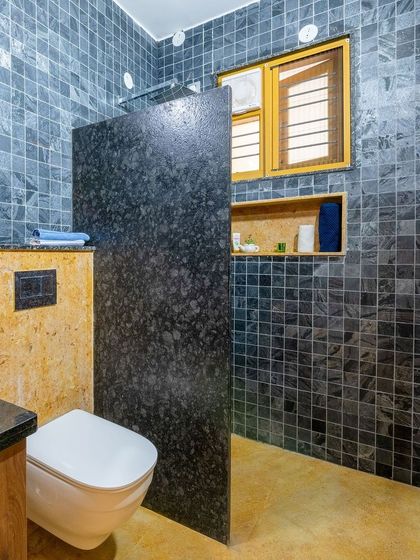 The layout of this bathroom maximizes space while maintaining a clean and organized look.