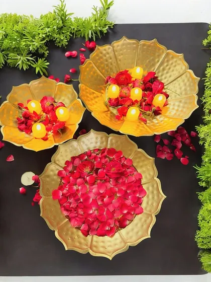 This set of three handcrafted brass urlis brings traditional elegance to your decor. Perfect for floating flowers and candles during festivals like Diwali or as a stunning year-round centerpiece, they add a touch of golden warmth to any surface.