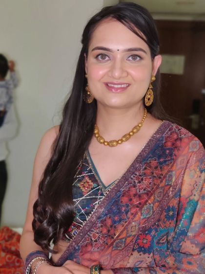 A beautiful, smiling portrait of Mallika. Her natural beauty shines through with this subtle and elegant makeup application.