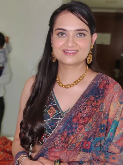 A beautiful, smiling portrait of Mallika. Her natural beauty shines through with this subtle and elegant makeup application.
