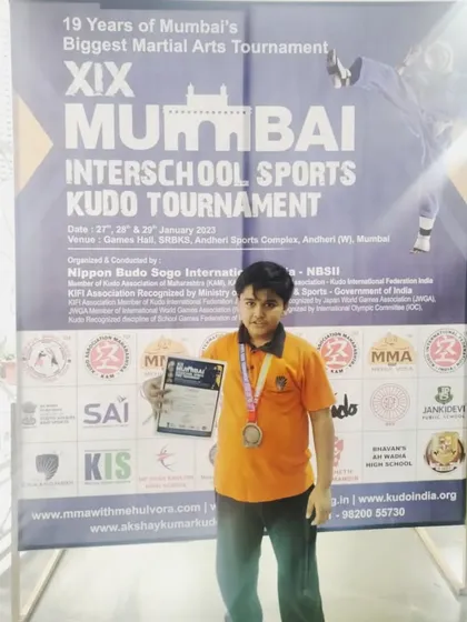 Hard work pays off. This is Arnav, one of our students, after winning second place at the Mumbai Interschool Kudo Tournament. We don't just train in the gym; we prepare them to test their skills and prove their grit.