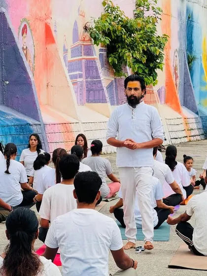 Leading a large group for International Yoga Day is a powerful experience. It shows the unity and collective energy that yoga brings. My focus is always on guiding each person, ensuring everyone feels connected to the practice.