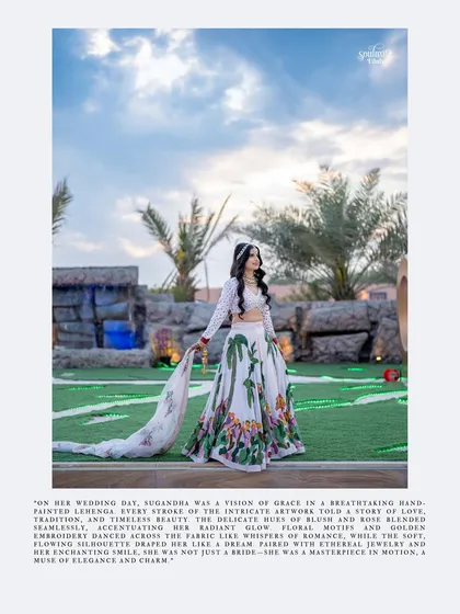 A full-length portrait of a bride in a unique, hand-painted lehenga. This artistic shot, styled like a magazine page, highlights the beauty and grace of her attire.