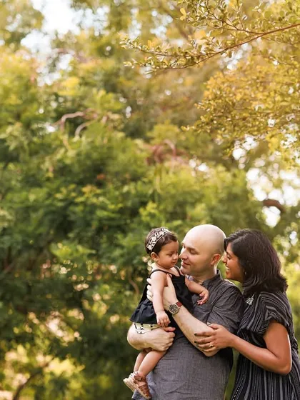 A beautiful story of family love, captured under the warm glow of the sun in a lush green park. Outdoor sessions provide a stunning natural backdrop for family portraits.