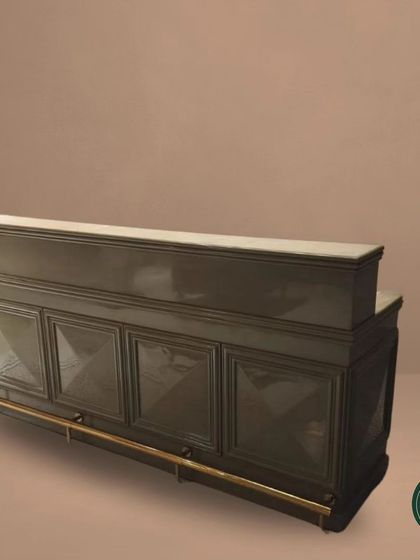 Another angle of our elegant bar counter, highlighting its glossy finish and classic silhouette. We build our bar units to be both beautiful statement pieces and highly functional service areas.