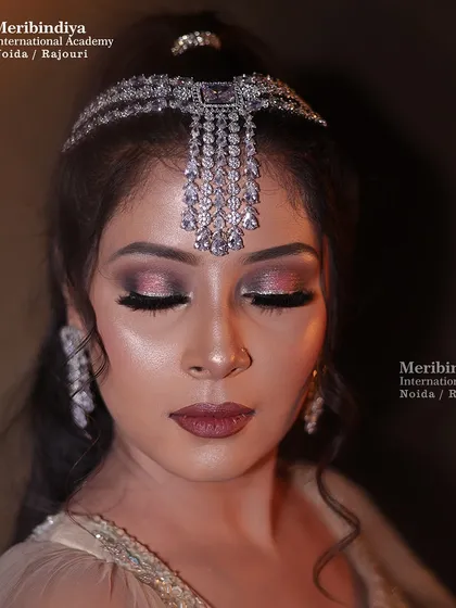 A close-up of the shimmery, metallic eye makeup, perfect for an evening engagement party. You'll master glitter and shimmer application for a high-impact effect.
