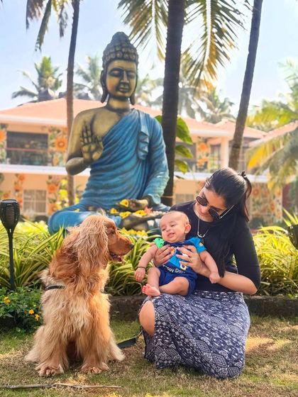 A peaceful moment with my boys in front of a Buddha statue during one of our trips.